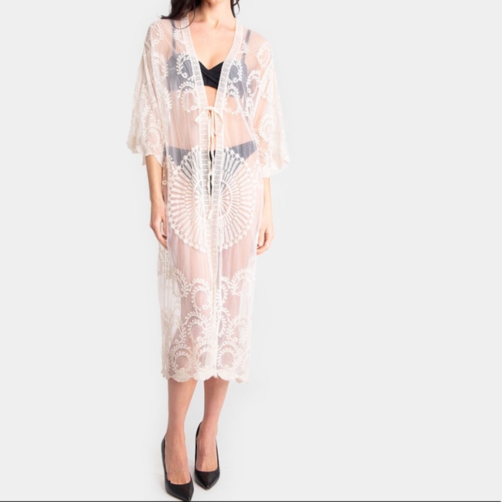 Ponchos/Coverups - Picture 3 of 8